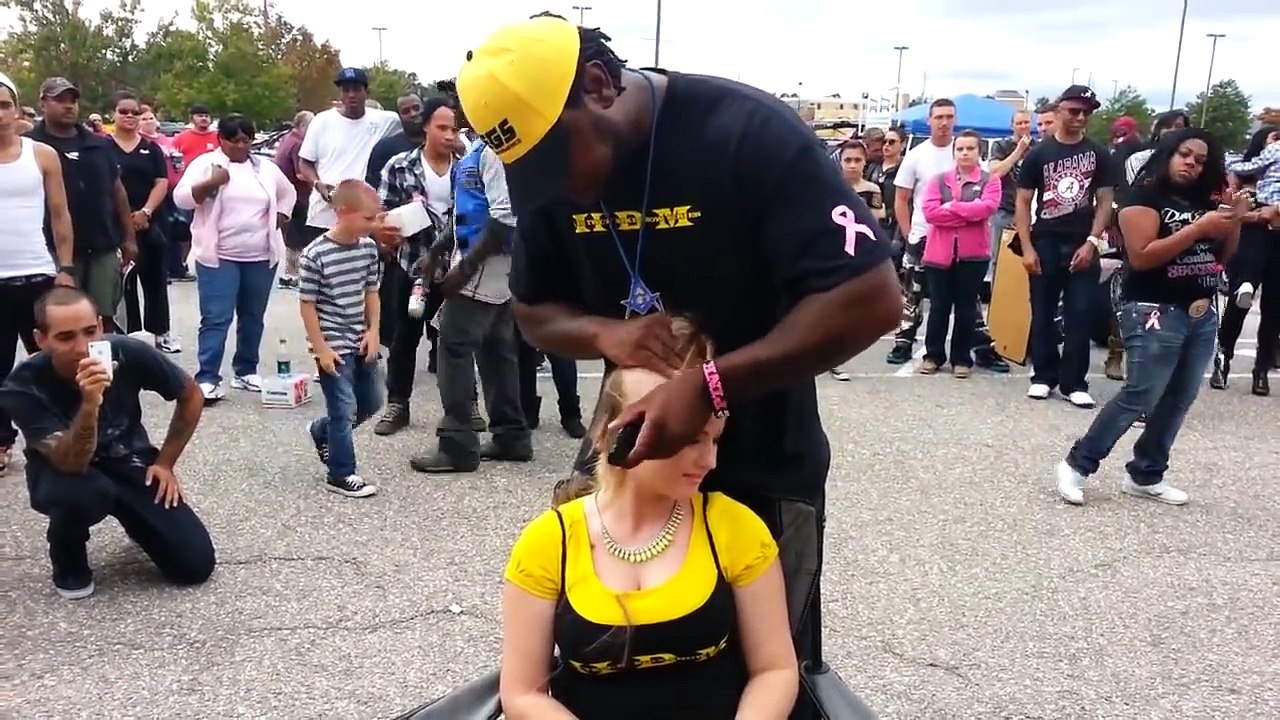 Headshave at car fair show