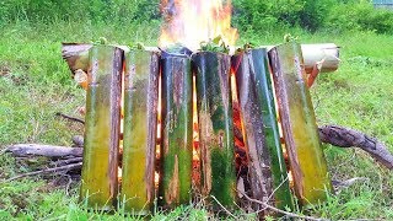 Amazing Village Cooking Style - Cooking Fish With Bamboo on Fire in My Village