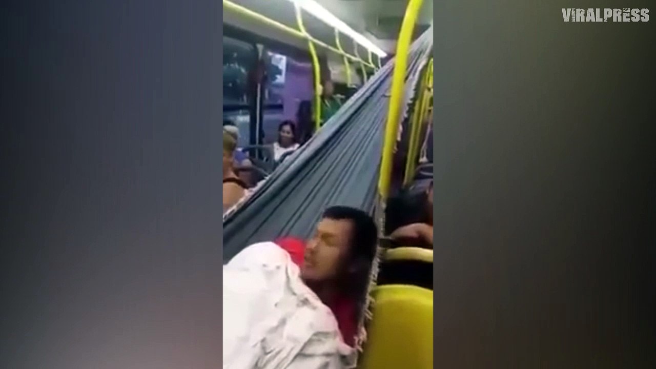 Passenger Relaxes By Pitching Hammock... On BUS