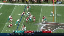 Atlanta Falcons running back Devonta Freeman weaves through Dolphins defenders on 44-yard gain