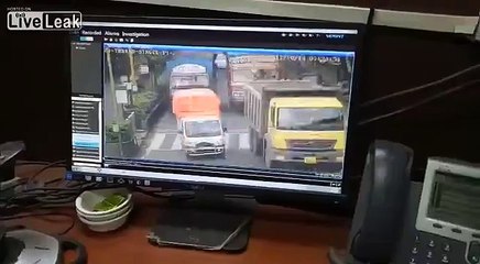 Woman ran over by a dump truck