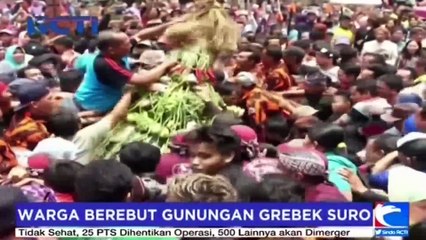 Video herunterladen: Sejumlah Anak Terjepit saat Berebut Gunungan Grebek Suro Banyumas