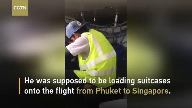 Baggage handler caught stealing from luggage in Thailand