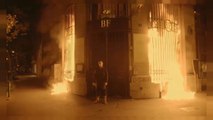 Artist sets fire to bank in Paris