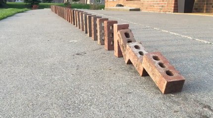 Watching A Double Domino Effect With Bricks Is Just Incredibly Satisfying