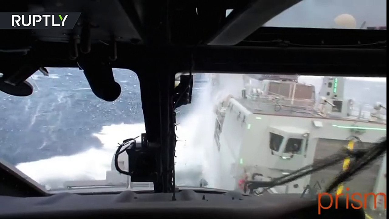 EXTREME landing on Navy ship during bad weather...