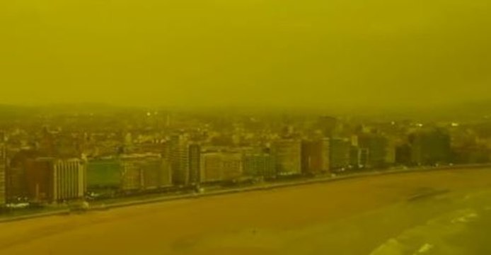Aerial Footage Shows Eerie Yellow Sky Over Gijon as Spanish Wildfires Burn