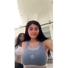 Kylie Jenner Flashes Glimpse Of Baby Bump & Huge Chest