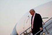US judge blocks latest Trump travel restrictions
