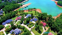 Beautiful Aerial View of a Mansion on the water in Flowery Branch, Georgia filmed by DroneVideos.com