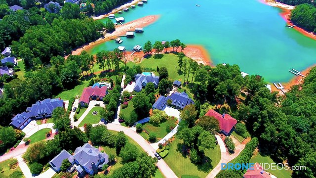 Beautiful Aerial View of a Mansion on the water in Flowery Branch, Georgia filmed by DroneVideos.com