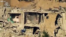 Syrian rebels lob an OMAR cannon shell into a building occupied by 4th Division snipers