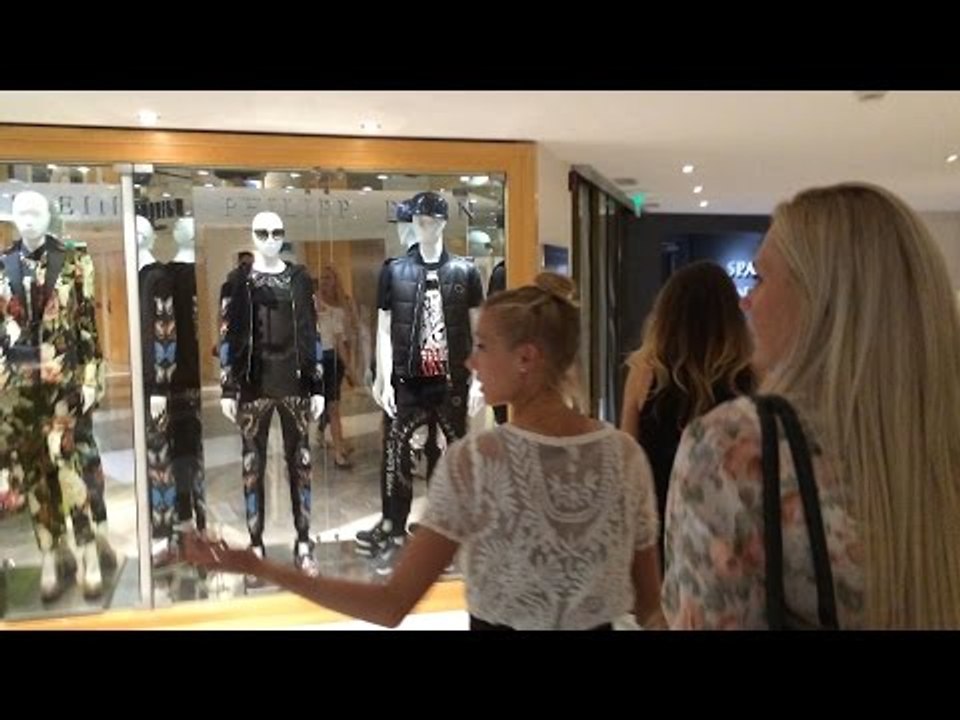 Molly Ludlow, Katie Mackey, and Gabe Grunewald celebrates Monaco PRs at Monte Carlo