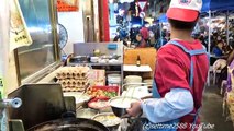 Hong Kong Street Food. Making a Fried Oysters Cake. Seen in Kowloon