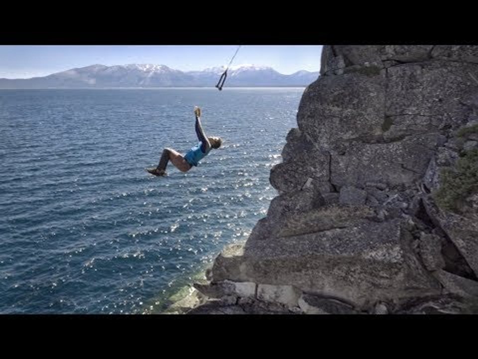Thrill-Seekers Fly Through the Air on a Giant Rope Swing