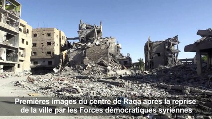 下载视频: Silence de mort et immeubles effondrés dans Raqa sans jihadistes