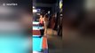 UPDATED SCRIPT: Naked woman in bar chases customer around pool table with cue