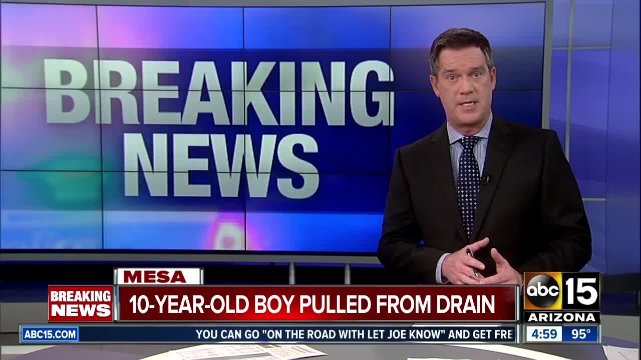 Young boy pulled from storm drain in Mesa