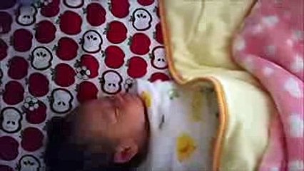 Day27 - Wilson Baby is Trapped in his Wrap Trying to Break Free. He later Kicks Back