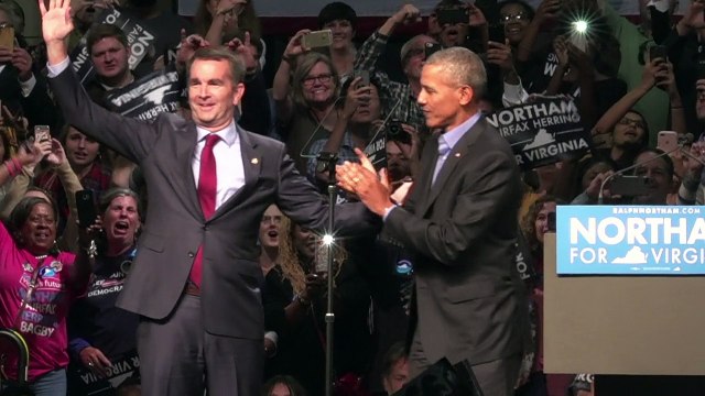 Obama slams 'politics of division' on return to campaign trail