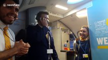 Cabin crew member sings  onboard Ryanair flight