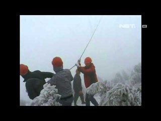 NET5 - Menghilangkan es yang menutupin Kabel PLN