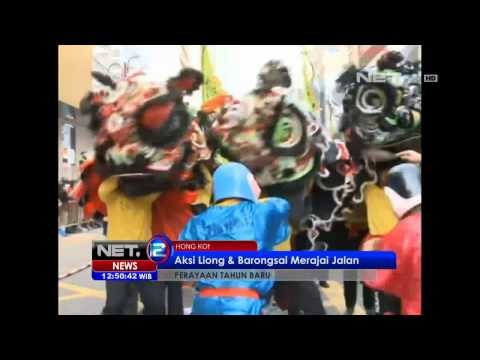 NET12 - Warga Hongkong menggunakan topeng Budha raksasa Tahun Baru
