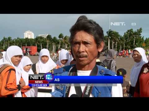 NET12 - Musim Liburan Juru Foto Keliling Raup Peningkatan Omset