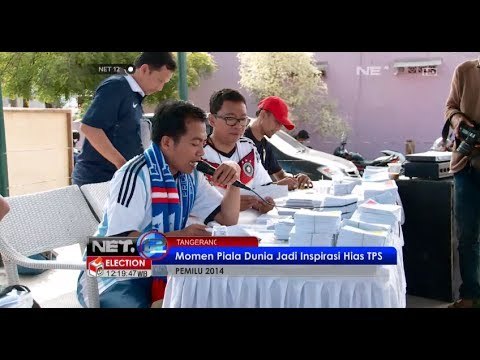 NET12 - TPS dengan nuansa piala dunia, para petugas kenakan kostum bola