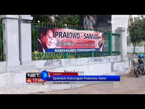 NET17 - Kelompok tak dikenal memasang spanduk dukungan Prabowo Subianto dan Abraham Samad