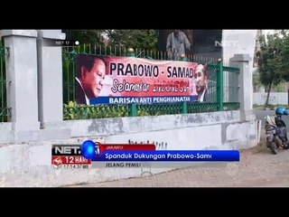 NET17 - Kelompok tak dikenal memasang spanduk dukungan Prabowo Subianto dan Abraham Samad