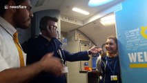 Cabin crew member sings  onboard Ryanair flight