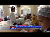 Peringati NuzuluL Quran remaja masjid berastagi hibur anak anak pengungsi Sinabung - NET12