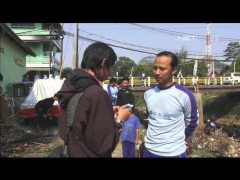 Peduli lingkungan puluhan siswa bersihkan sungai Cisangkuy - NET5