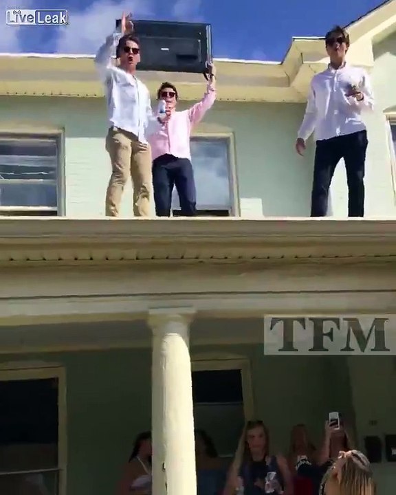 Guys Hit Woman On Head with TV Thrown From Roof at Party