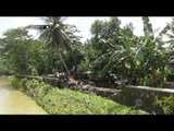 Aparat TNI dan Polri kerahkan bantu evakuasi rumah yang rusak akibat banjir bandang Kebumen - NET12