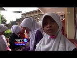 Siswa dan Guru Pesantren Persatuan Islamal Ittihad Bersihkan Sekolah -NET12