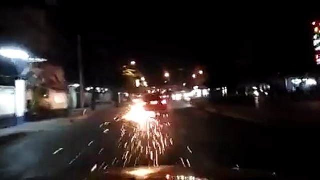Sparks Fly From Car After It Crashed Into Moped