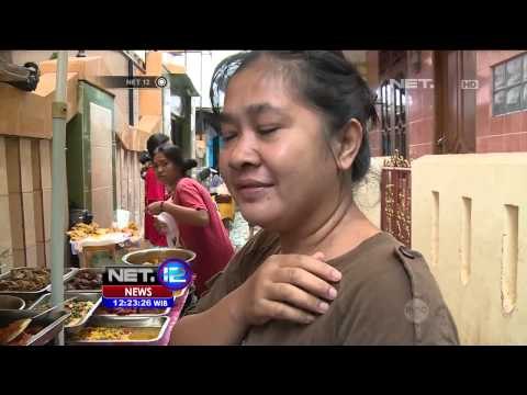 Sungai Ciliwung meluap, ratusan rumah di Kampung Pulo terendam banjir 19 Februari 2015 - NET12