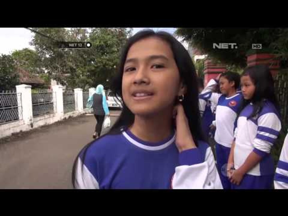 Ratusan siswa SD keliling kampung untuk bersihkan sampah - NET12
