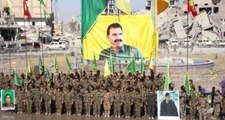 Pentagon, Destekledikleri PKK/PYD'li Teröristlerin Rakka'da Öcalan Posteri Açmasını Kınadı