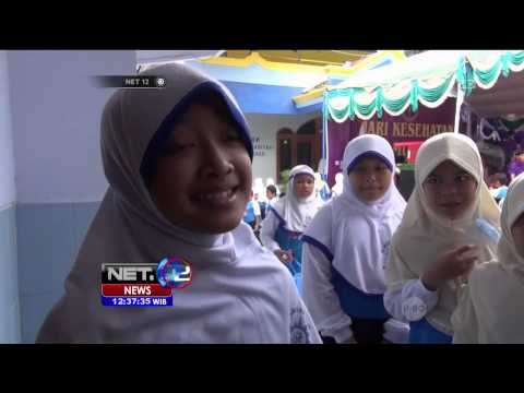 Antisipasi gigi berlubang ratusan siswa SD adakan gosok gigi massal - NET12