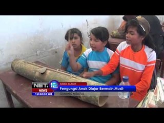 Download Video: Komunitas Pecinta Alat Musik dan Fotografi Karo Hibur Anak-anak Korban Erupsi Sinabung -NET12