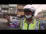 Polisi Bantu Warga Bersihkan Abu Vulkanis Sinabung - NET16