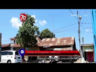 Seorang Pemuda Nekat Mengibarkan Bendera di Atas Tower - NET24