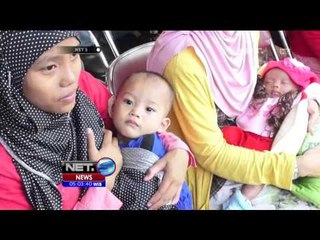 Ratusan Ibu di Kecamatan Baleendah Menerjang Banjir Untuk Bawa Anak Imunisasi - NET5