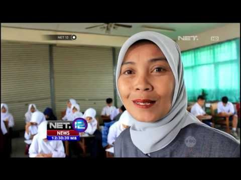 Pasca Banjir, Siswa Tetap Ikuti Ujian Tengah Semester - NET12