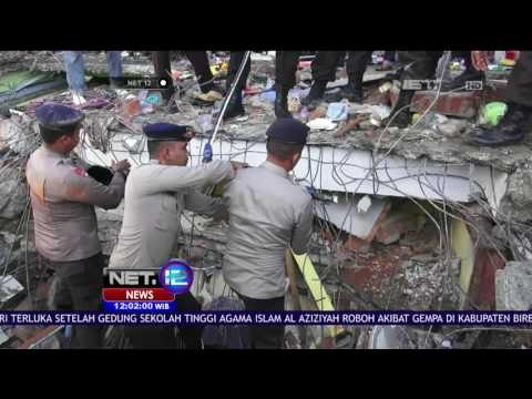 Petugas Gabungan Kembali Lakukan Evakuasi Reruntuhan Bangunan di Pidie Jaya Aceh - NET 12