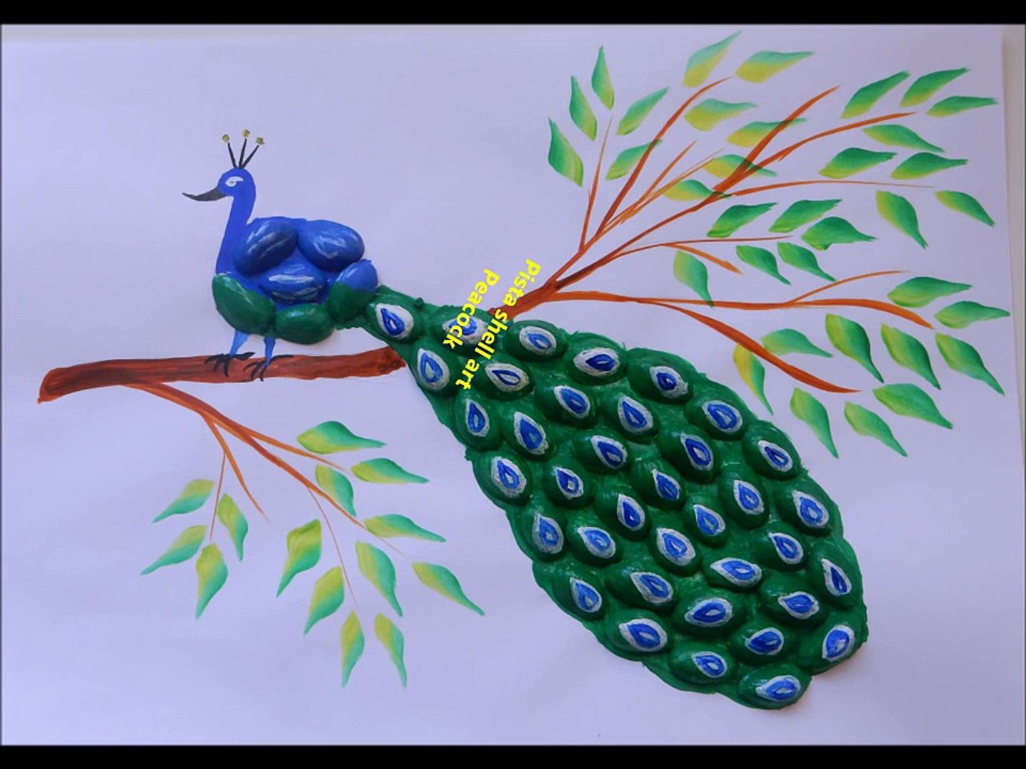 Павлин из семечек тыквы