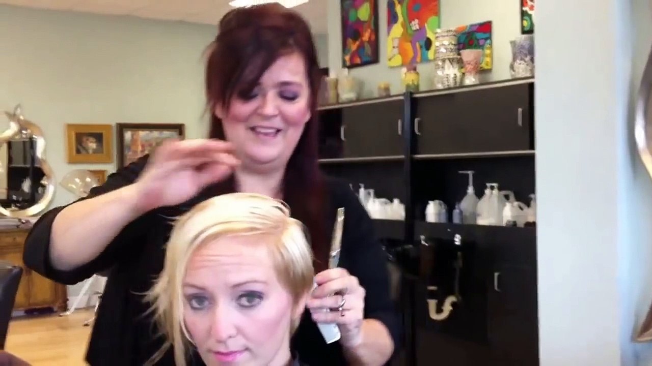 Blonde asymetric haircut by Stephanie